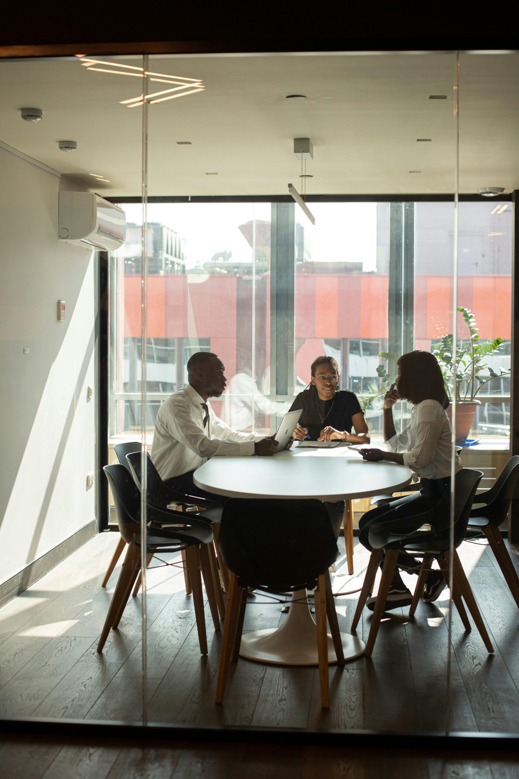 Contract negotiation meeting — technology insurance and customer contract requirements in Canada