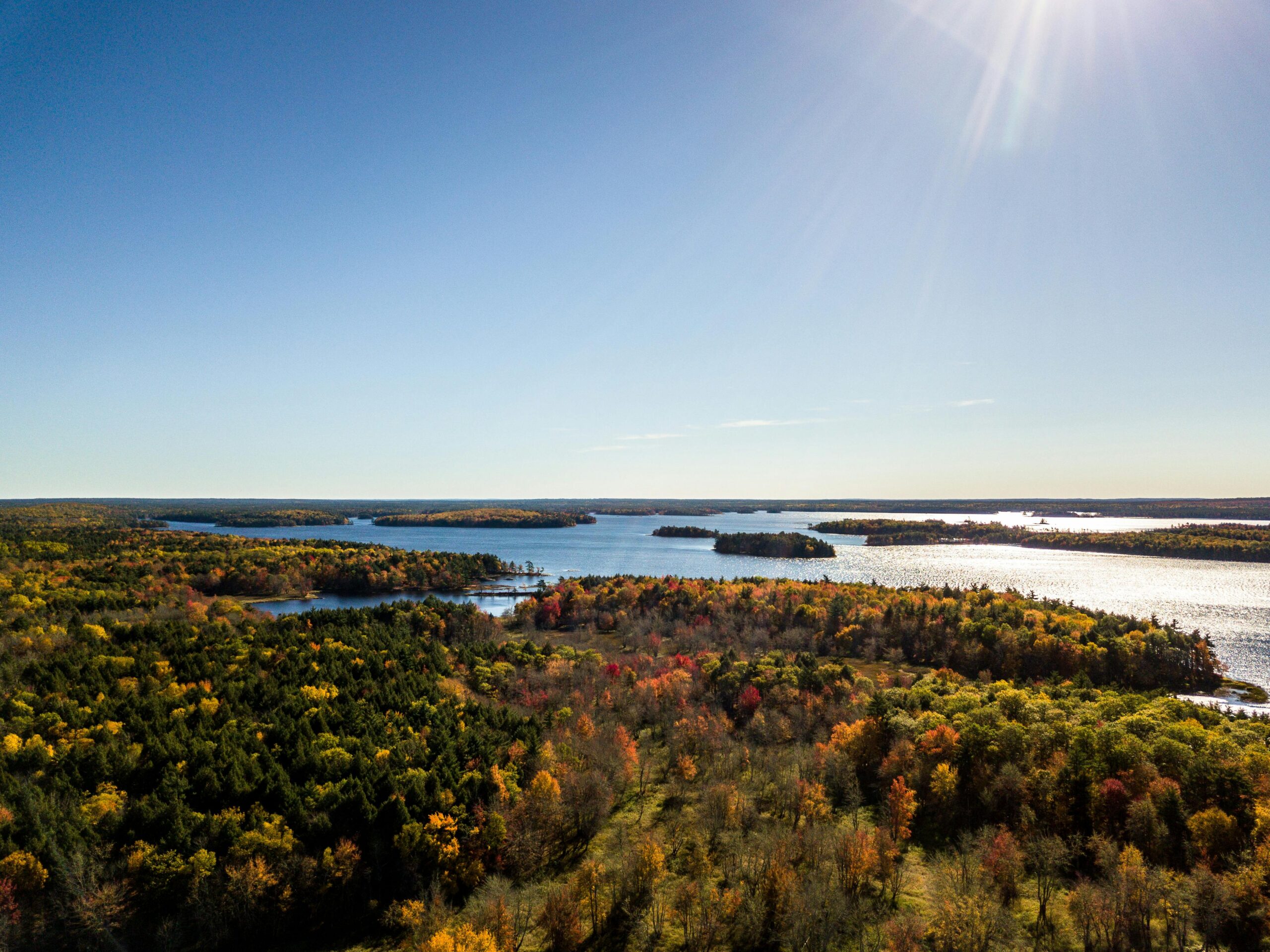 Forest and lake habitat from the air — renewable energy insurance and environmental exposure in Nova Scotia