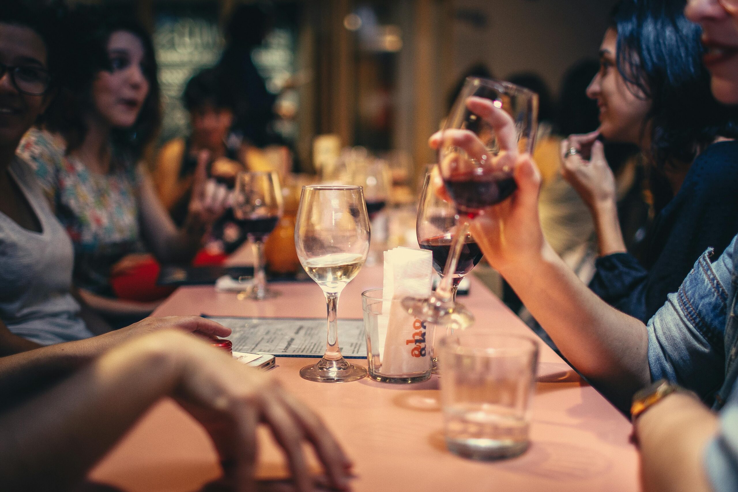 Guests dining and drinking in a restaurant — hospitality insurance for Nova Scotia bars and restaurants