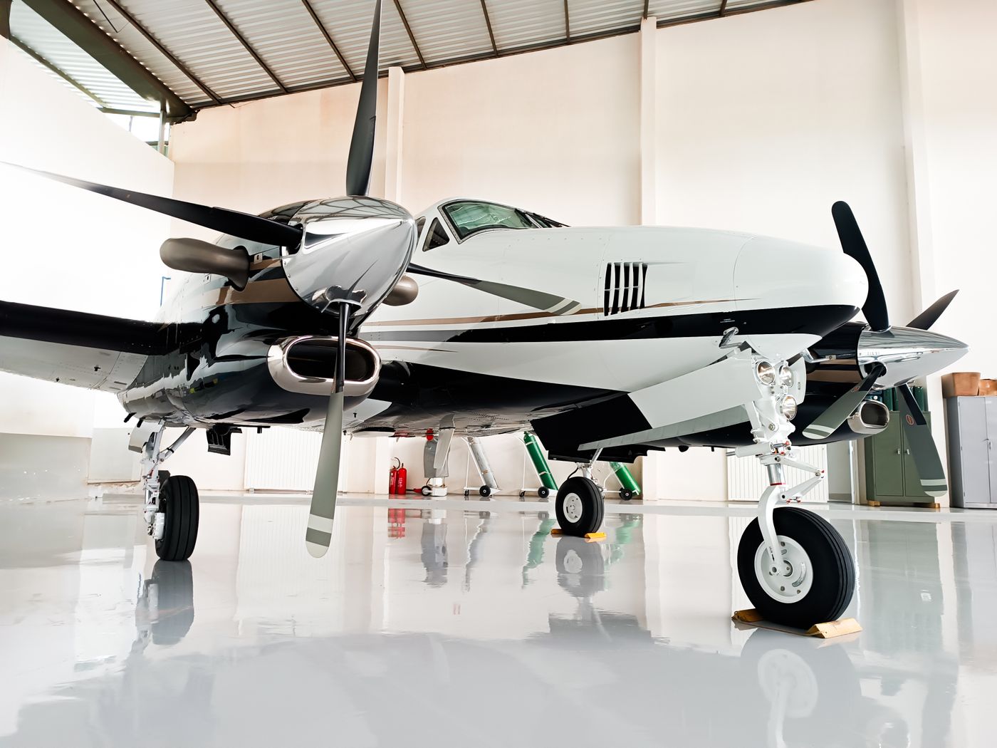 Owner-flown aircraft in a hangar insured under an aviation insurance policy