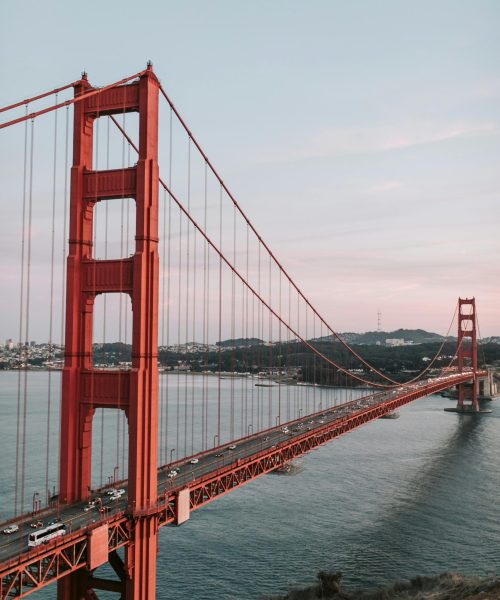 Sunset view of the iconic Golden Gate Bridge, capturing its stunning architecture and vibrant colors.